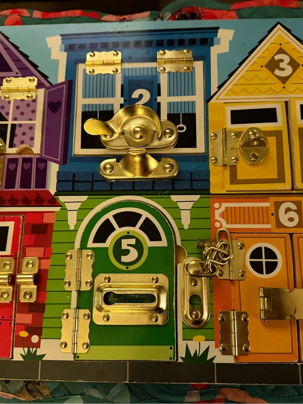 Melissa & Doug latches Kids Busy Board with Locks and Latches!